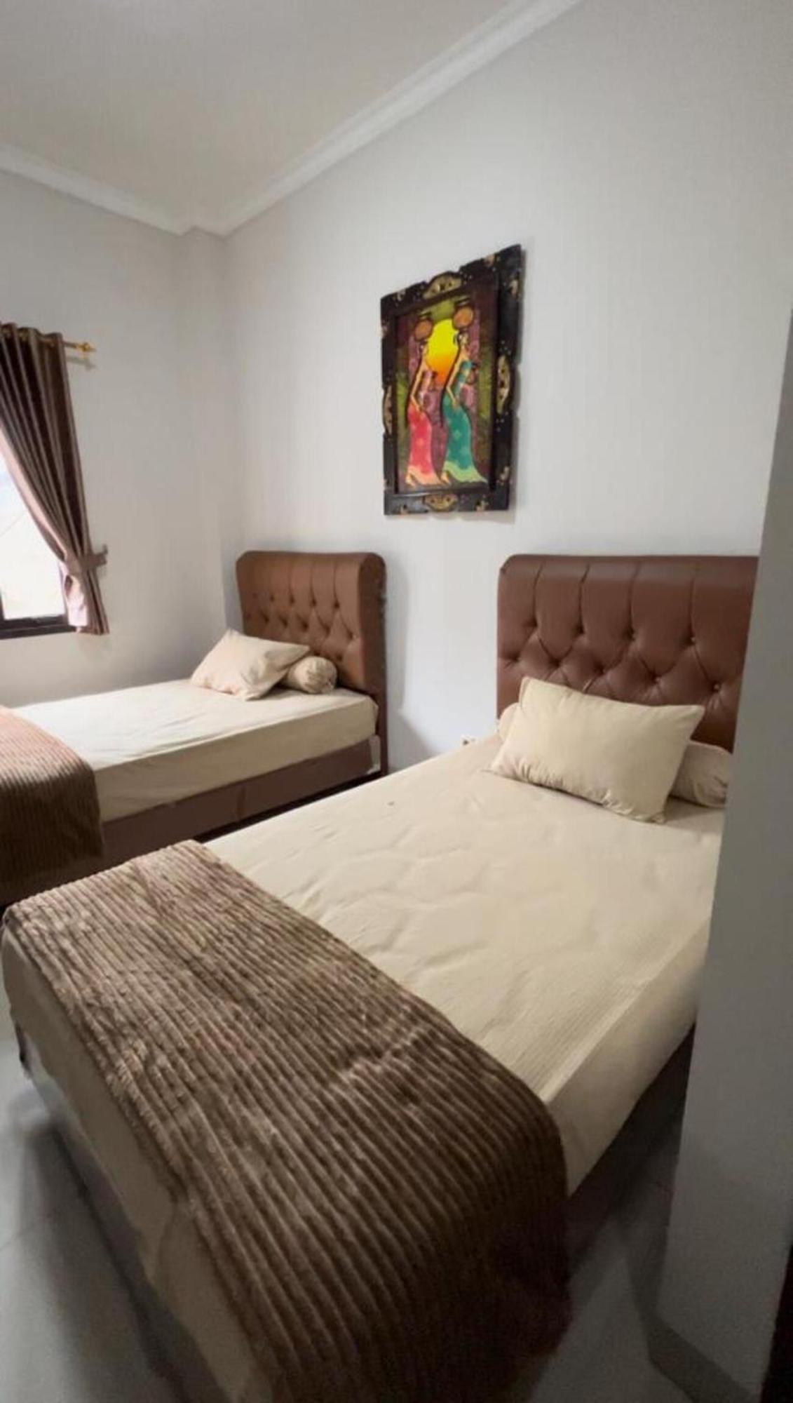 Hens Guesthouse Syariah Gadobangkong Extérieur photo